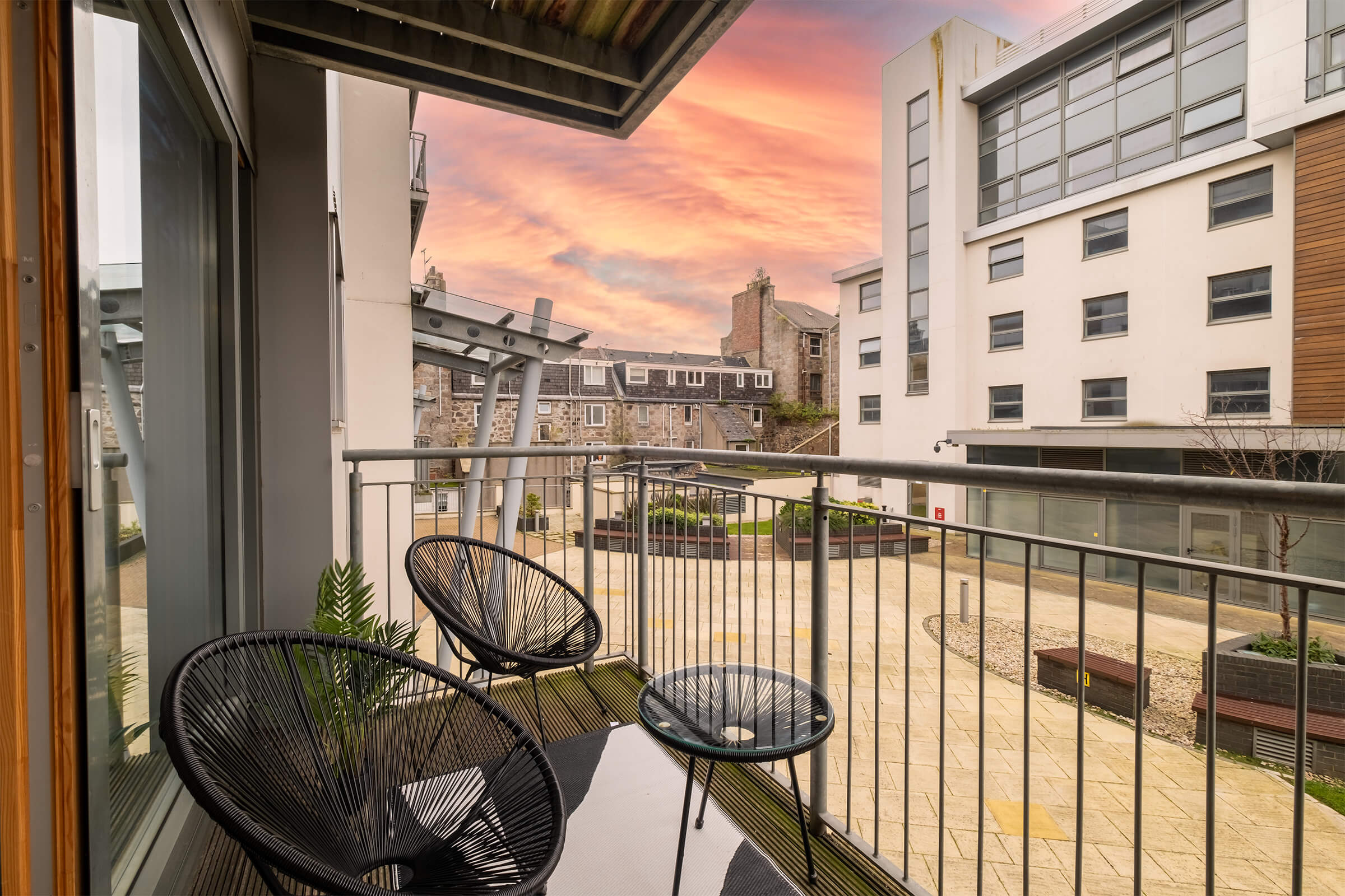 Balcony view across courtyard from apartment